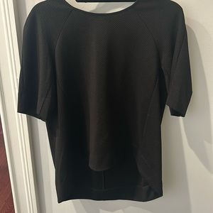 Oversized black pique pullover,  elbow length sleeves, back slightly longer